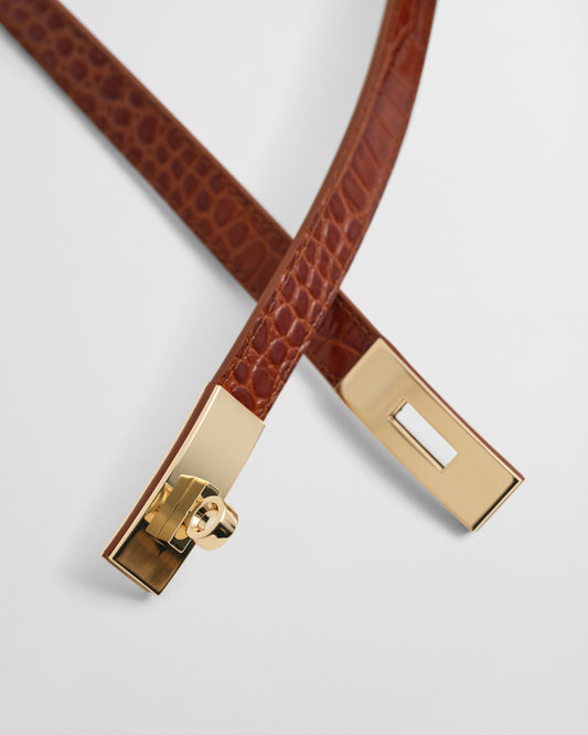 Ceinture effet croco à boucle tournante