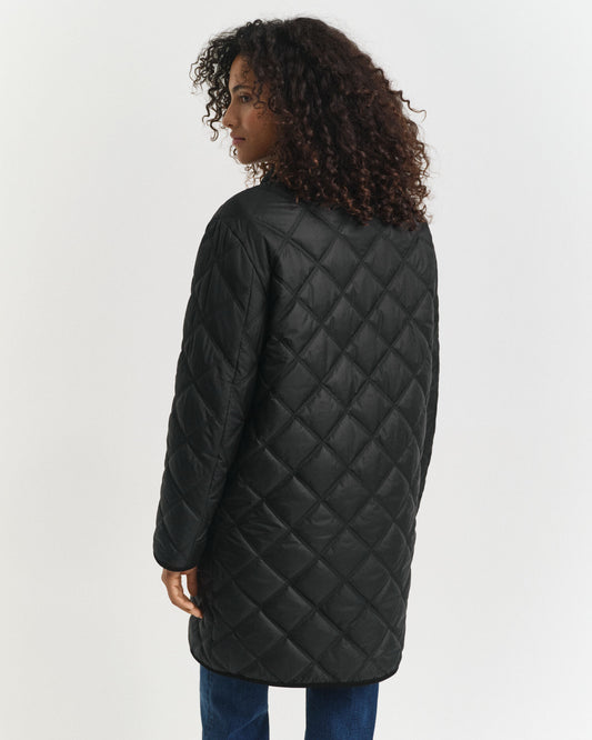 Manteau matelassé avec finitions en velours côtelé