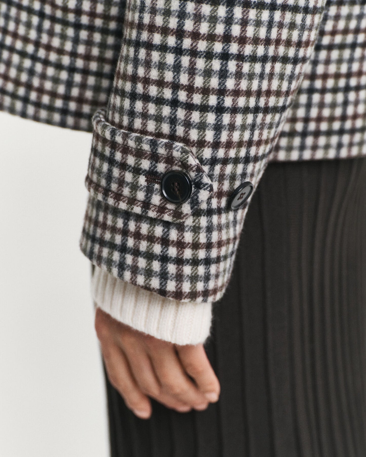 Manteau court en laine mélangée à carreaux