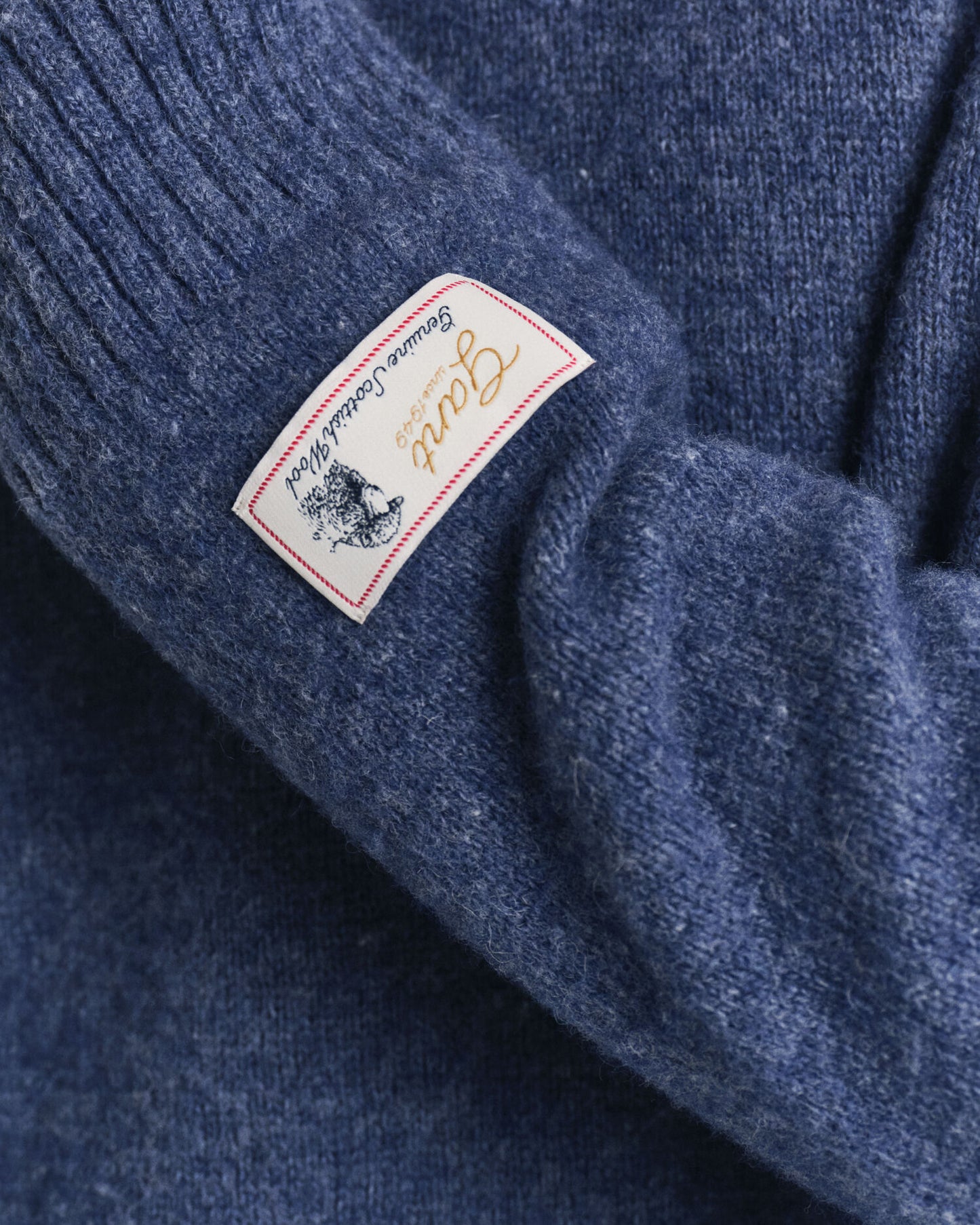 Pull ras du cou en laine écossaise